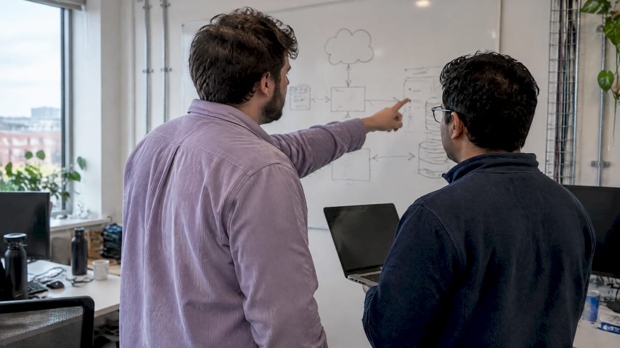 Engineers tracing a cloud cost root cause