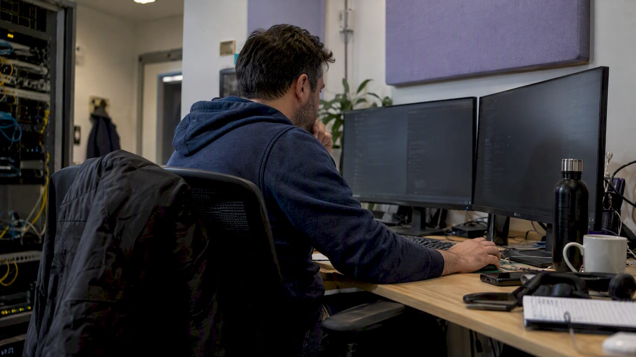 Engineer reviewing Kubernetes autoscaling settings